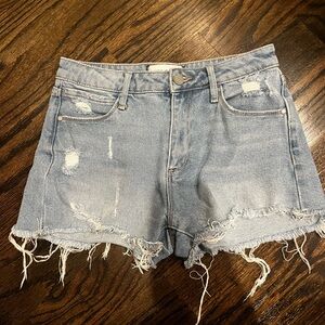 Blue ripped jeans shorts